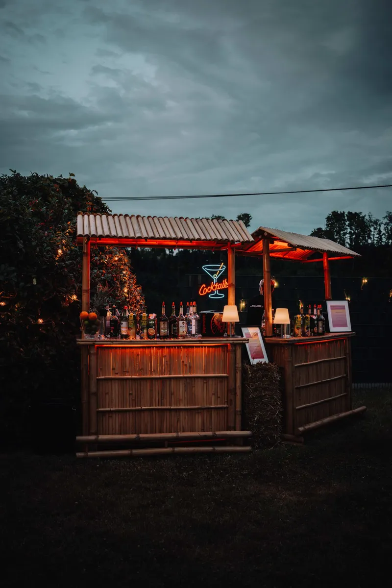 Mobile bamboo bar by Pfeil's Catering at an event