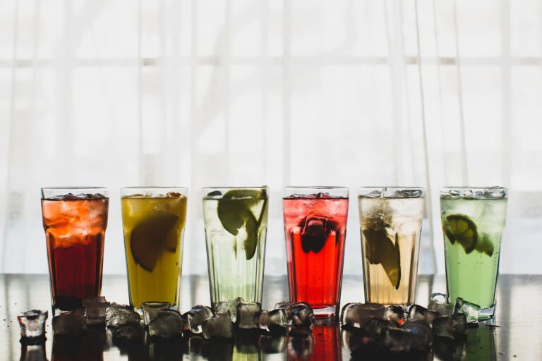 Colourful cocktails elegantly arranged on a bar
