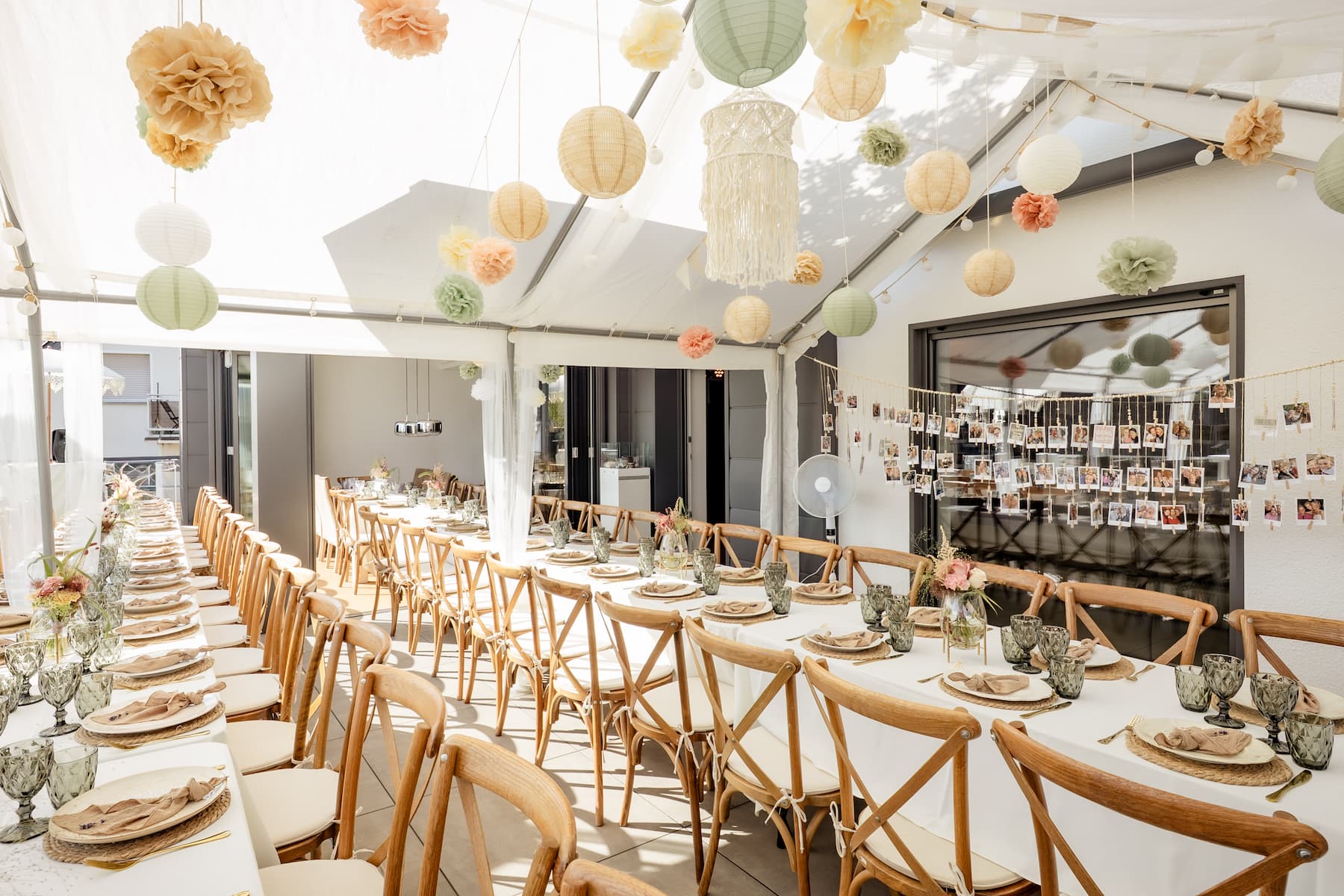 Long decorated tables at a private wedding celebration